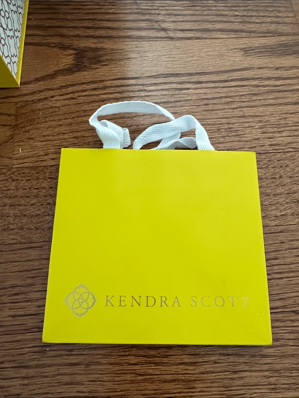 Kendra Scott small Yellow Gift Bag with White Handles- empty